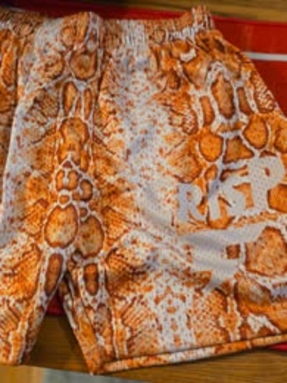XLARGE CRISPY NYC ORANGE SNAKESKIN SHORTS